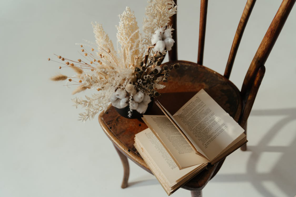 A horror book with flowers on a chair